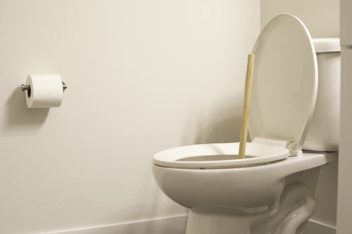 Plunger in toilet
