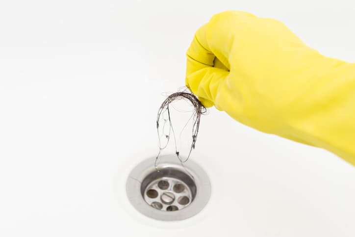 pulling hair clog from drain